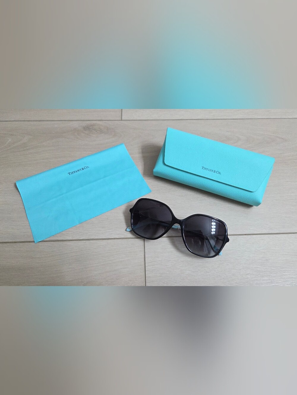 Tiffany & Co. Black Gradient Women's Sunglasses with Blue Accents